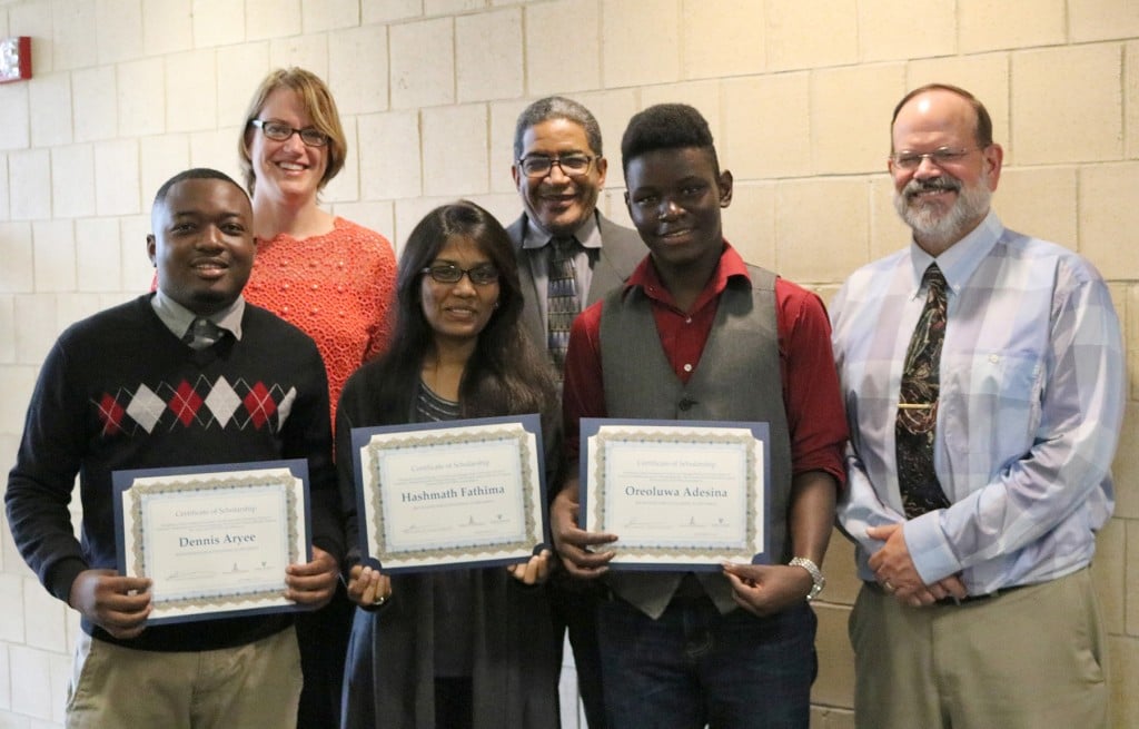 2015 Extreme Science Scholars are presented certificates from program sponsors. From left front: Dennis Ayree, Hashmath Fathima, Oreoluwa Adesina, Dr. John Beatty (ARL). From left back: Dr. Lori Graham-Brady (HEMI, JHU) and Dr. Alvin Kennedy (SCMNS, Morgan State).