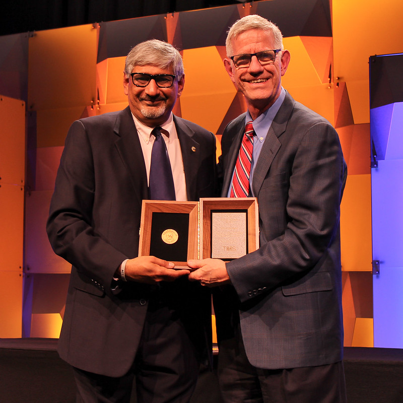 Kevin Hemker receiving the Oleg D. Sherby Award, presented by Srinivas Chada