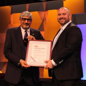 Tim Rupert receiving the Brimacombe Medal, presented by Srinivas Chada