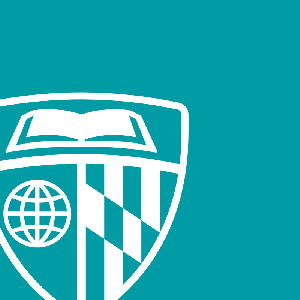 white Johns Hopkins University shield on a teal background
