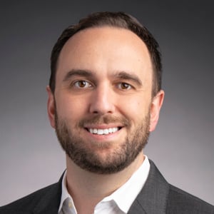 headshot of Eddie Gienger